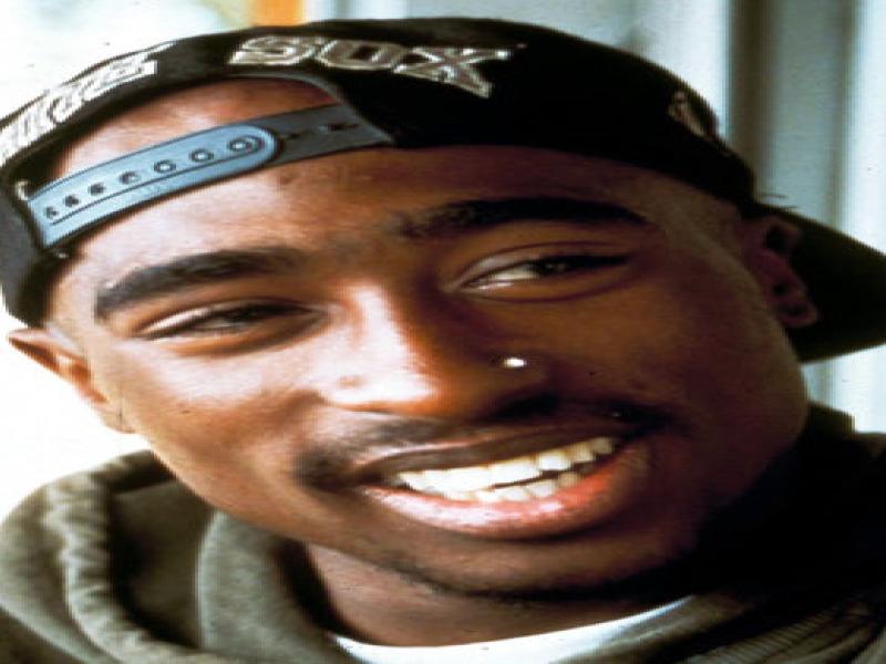 <abbr title=Translation missing (en)></picture>Tupac Shakur</abbr>